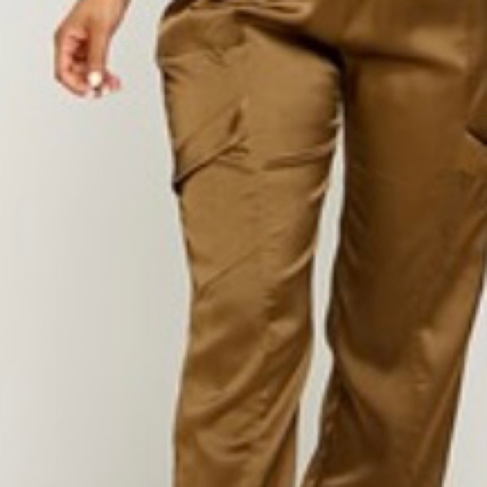 All I can say is WOW!  This is a show stopper. Satan 2 piece jumpsuit is must - Picture 4 of 4